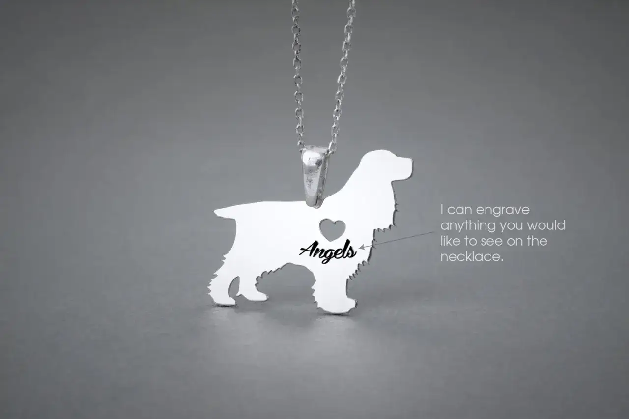 Pendentif en forme de cocker, gravé